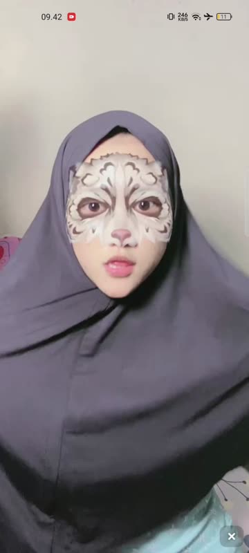 Jilbab hitam daster biru spill tokek mancung
